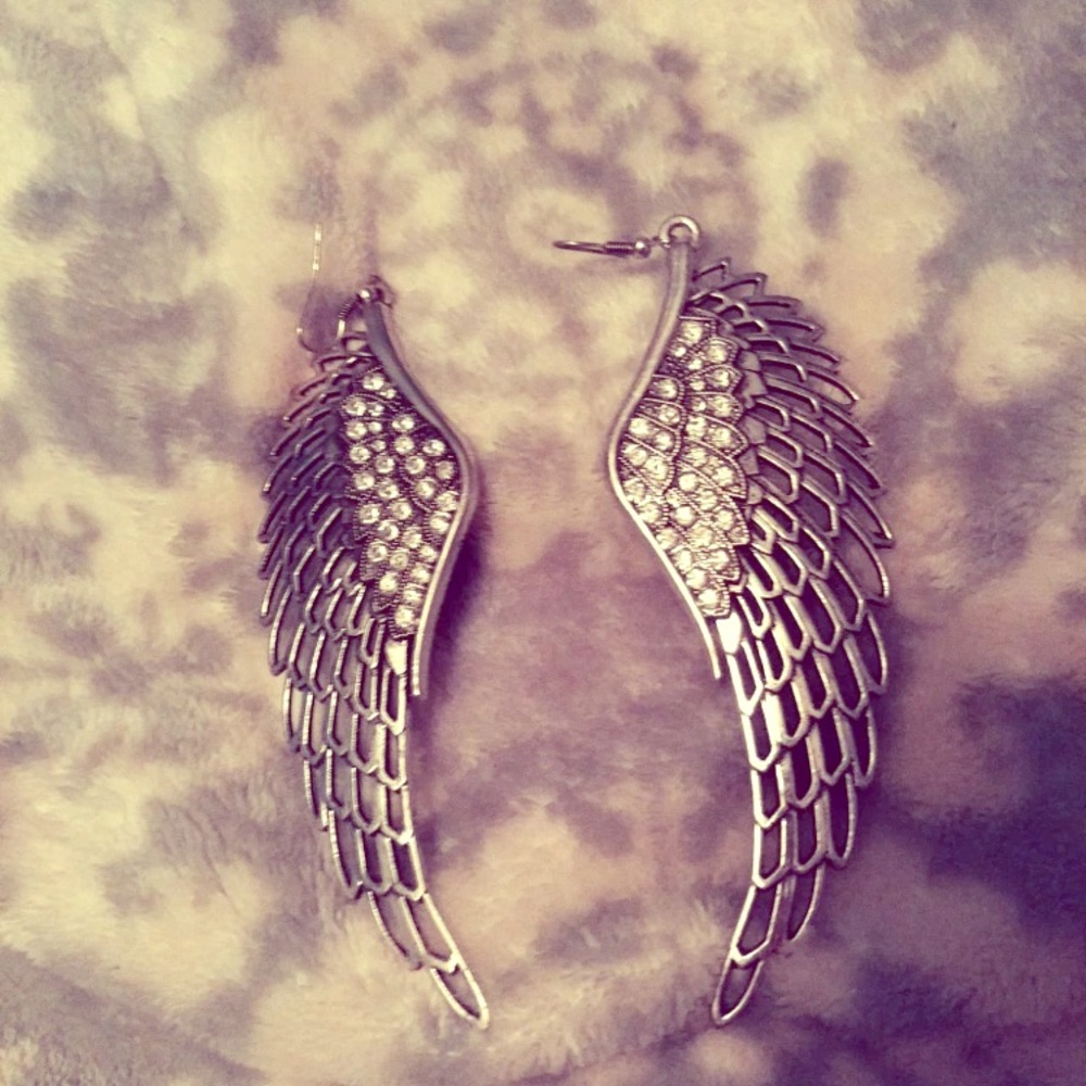 Wing earrings. Never worn